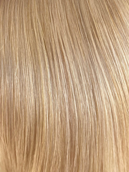 sandy blonde tape in hair extensions