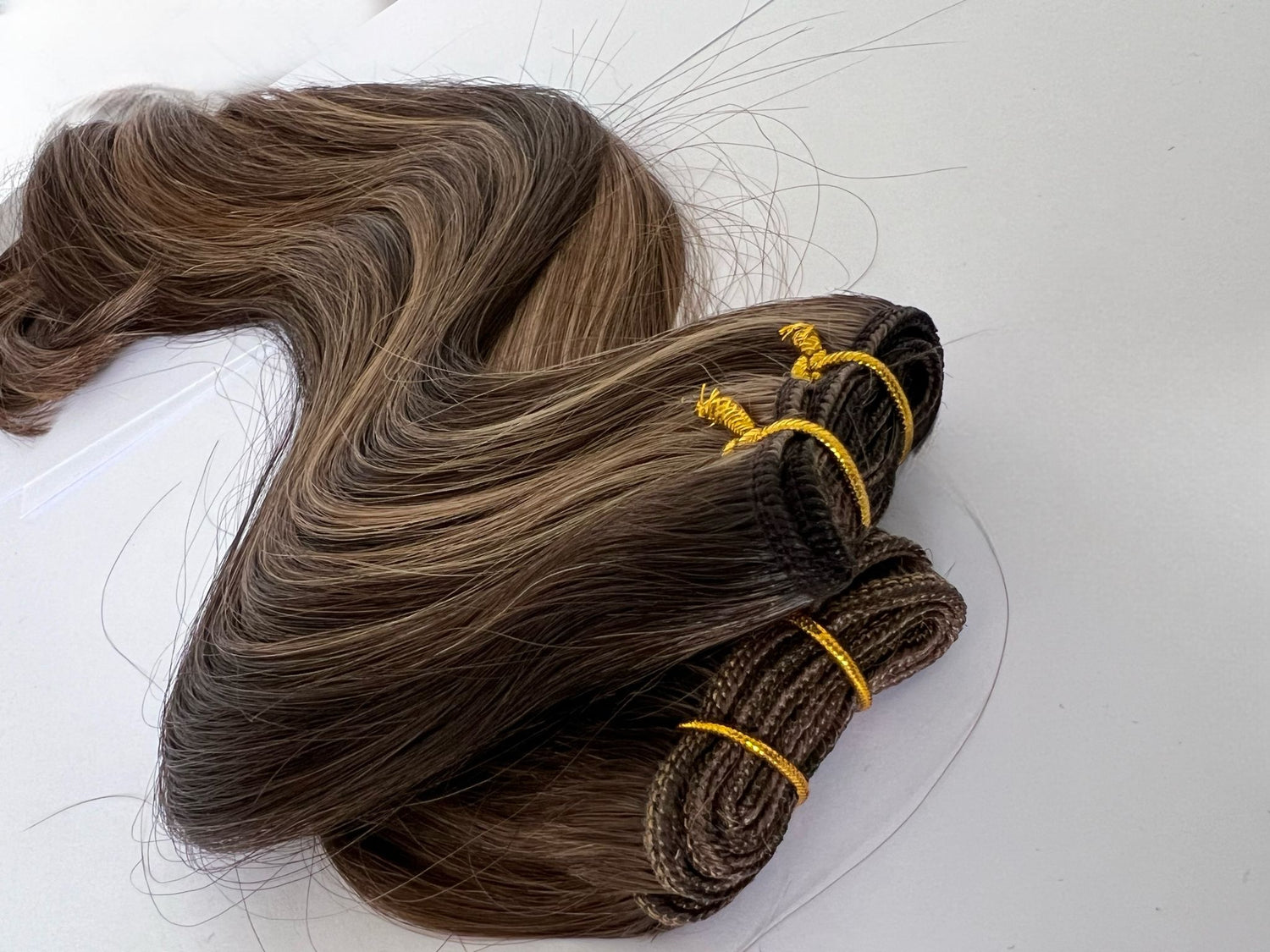 MACHINE WEFT HAIR EXTENSIONS