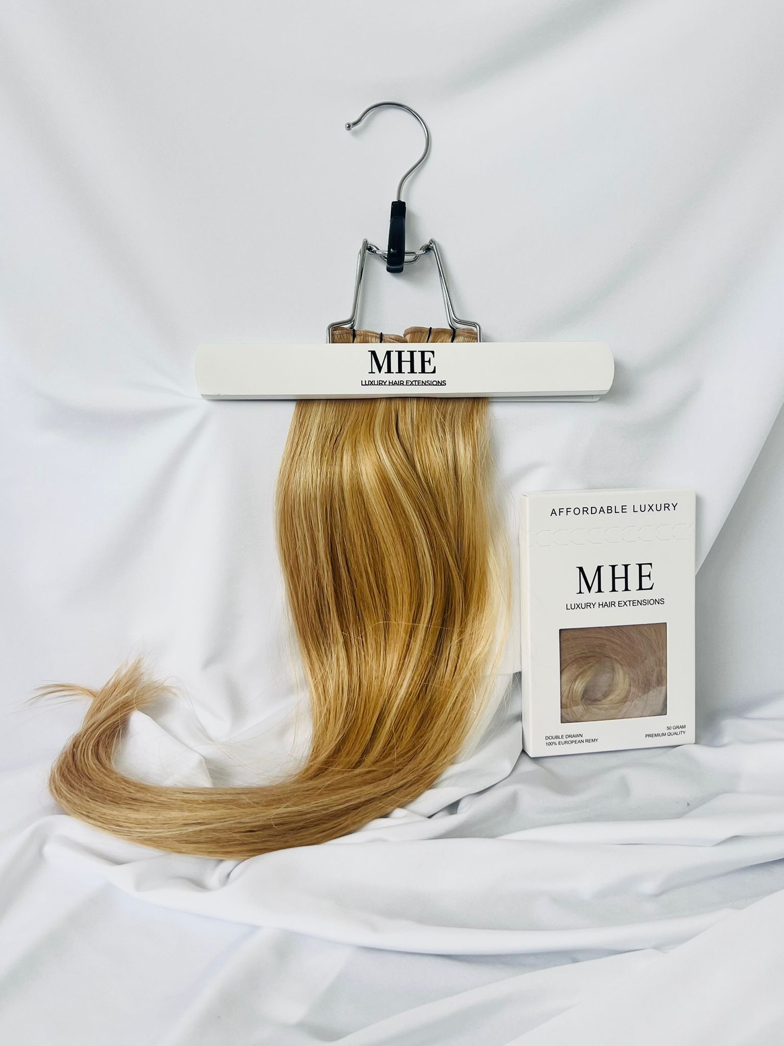 18/60 Honey Blonde/Pure Blonde clip in hair extensions