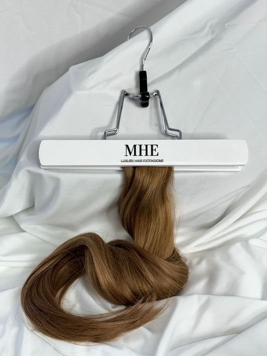 dark golden blonde tape in hair extensions