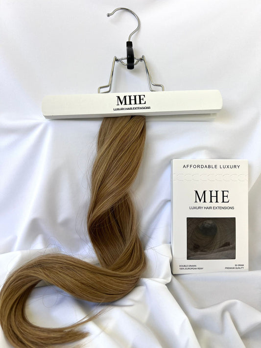 dirty blonde tape in hair extensions