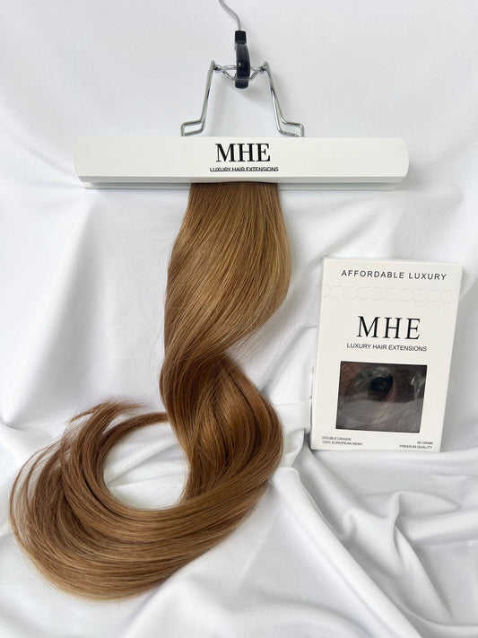 medium golden blonde tape in hair extensions